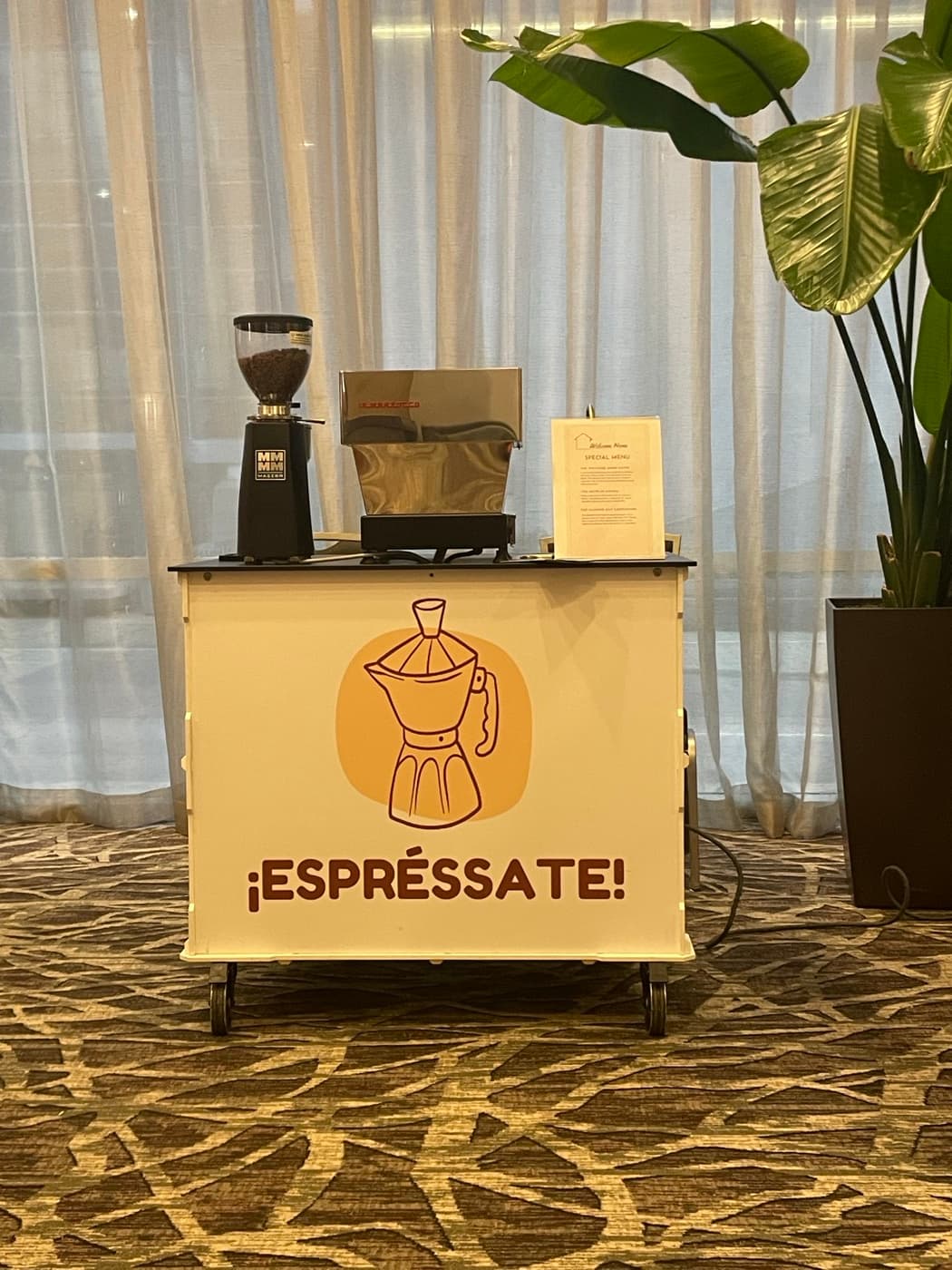 Espréssate mobile espresso bar set up for a corporate event in a hotel ballroom